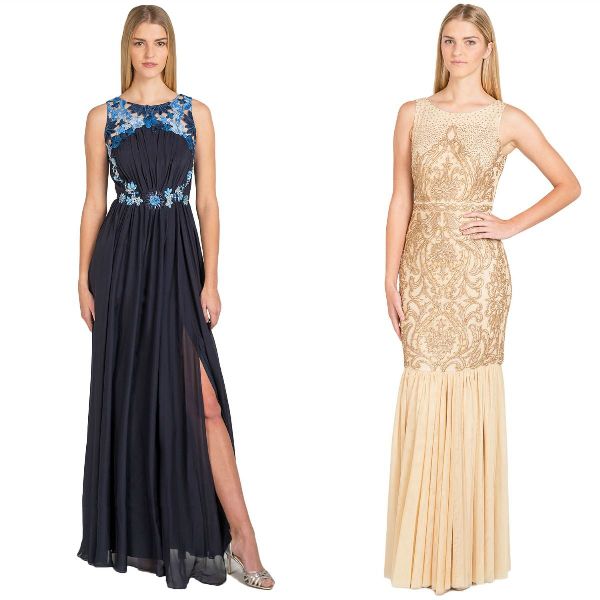 Woman in a navy blue evening gown with floral embellishments and a thigh-high slit, and woman in a gold embellished mermaid gown with a pleated skirt