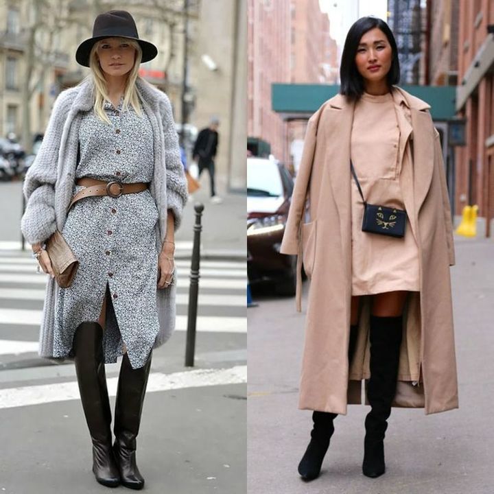 Woman wearing a grey oversized cardigan, blue floral dress, black knee-high boots, and a black wide-brim hat; woman in a beige dress, beige long coat, and black thigh-high boots with a small crossbody bag