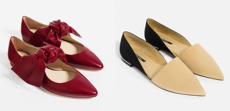 Close-up of red leather flats with a bow detail and black and beige pointed-toe flats