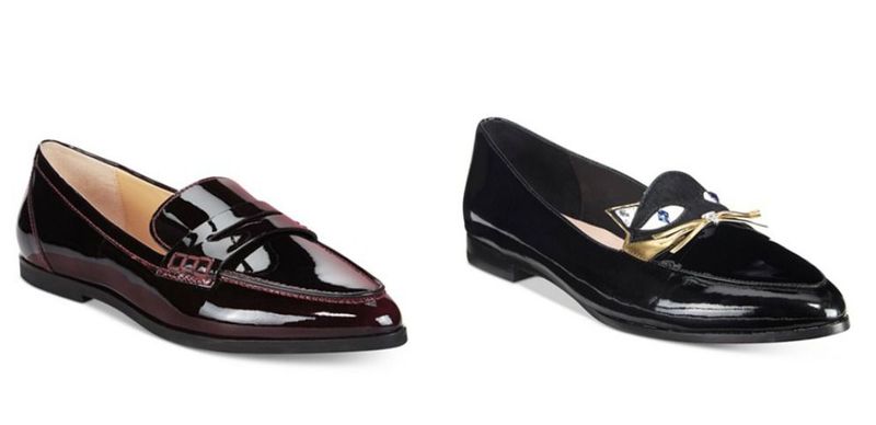 Close-up of burgundy patent leather loafers with a decorative strap and black patent leather flats with a gold bow detail