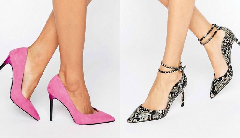 Close-up of pink suede high heels with a pointed toe and black and white snake print stilettos with ankle straps
