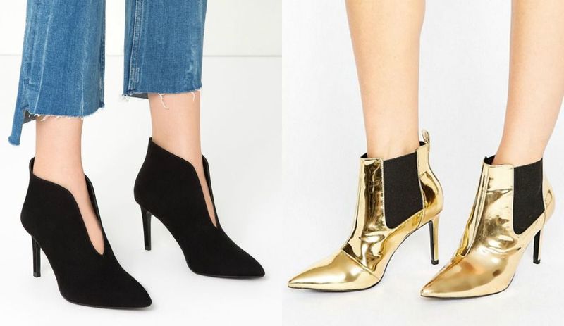 Close-up of black suede ankle boots with a pointed toe and cut-out detail alongside gold metallic ankle boots with a pointed toe and elastic side panels