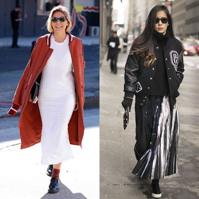 Woman wearing a red oversized coat over a white midi dress with black sneakers and sunglasses; woman in a black varsity jacket over a black sweater and silver pleated skirt with black ankle boots