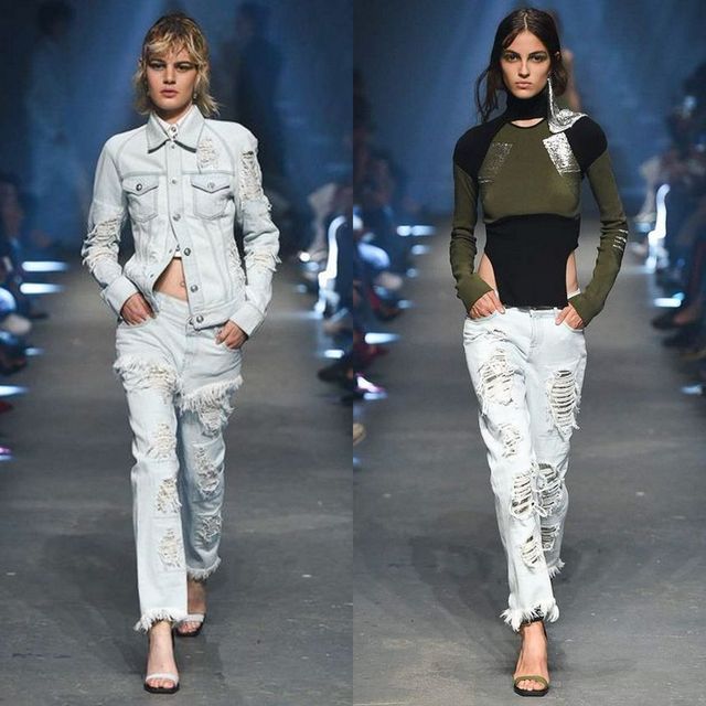 Two women wearing distressed white denim jackets, black and olive green fitted tops, and ripped white jeans with heeled sandals