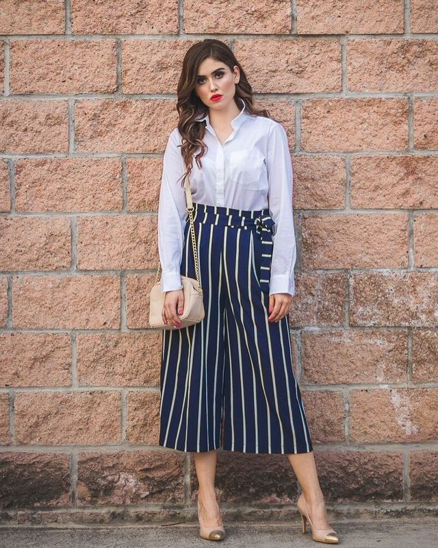 Striped culottes outfit with a white blouse and nude stilettos