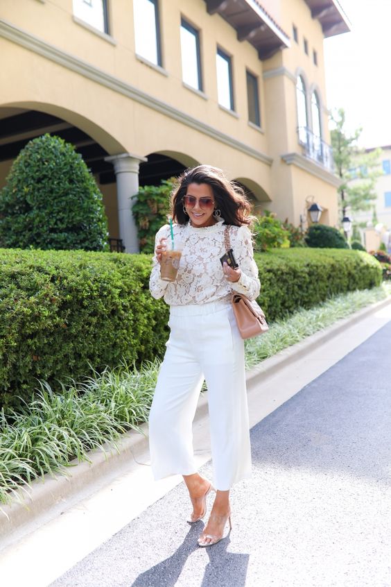 A chic pair of culottes pants and a fitting a lace blouse